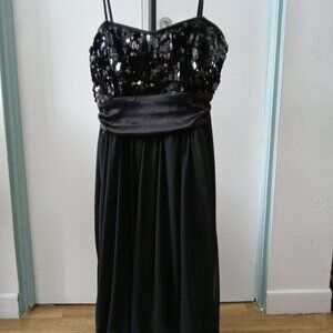 Beautiful black dress with sequined corset and balloon skirt
